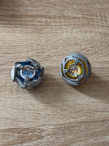 Beyblades one with missing - one,