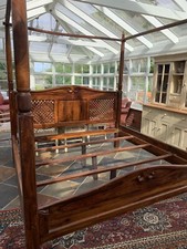 Teak four poster bed originally from Indonesia, purchased in the middle east