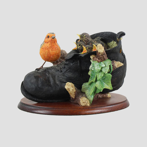 Robin with chicks - with,