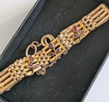 Antique gold plated bar bracelet with garnet flower stones