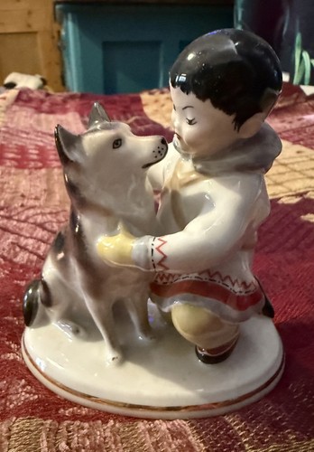 Eskimo and husky figurine - eskimo,