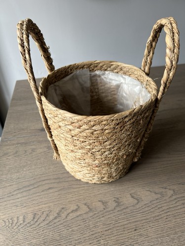 Beige woven basket for