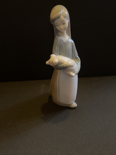Lladro girl holding piglet - girl,