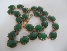 Vintage gold tone claw set green stone necklace. Safety chain. Czechoslovakia