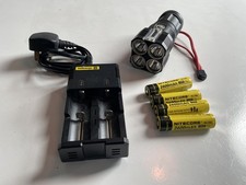 Nitecore  TM26 Quadray plus nitecore batteries and charger 