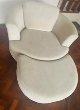 Cuddler Swivel Chair (also called Loveseat) with foot rest. Beige Grey Colour.