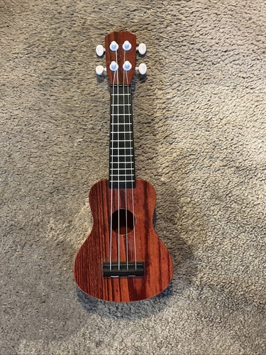 Unbranded small ukulele - small,