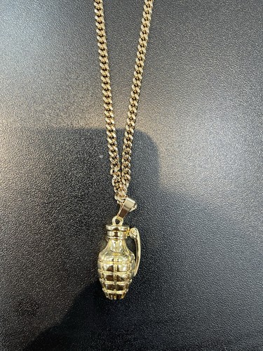 Gold tone hand grenade pendant - tone,