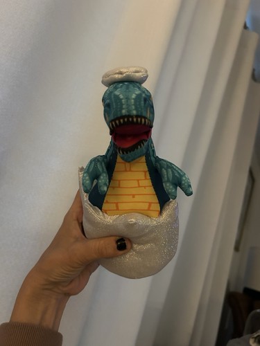 Dinosaur hatching from egg - hatching,