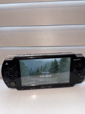 PSP 2000  slim and lite BLACK, very good condition cable, 1gb card, new battery