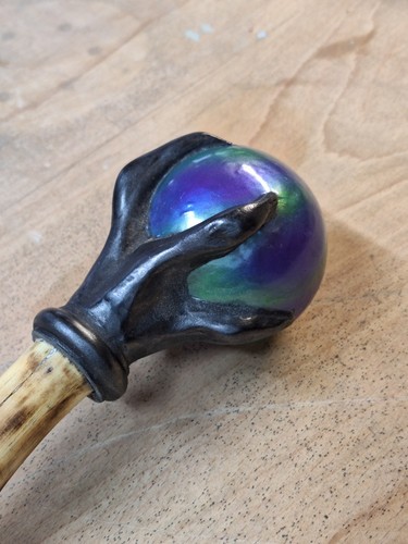Claw holding orb ball staff - ball,
