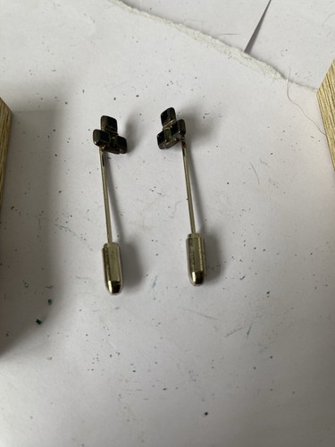 Two antique white - white, metal