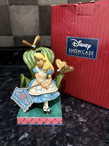 Disney traditions alice - traditions,