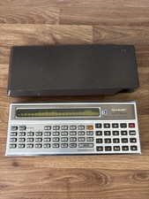 Sharp PC-1211 Pocket Computer - Spares Or Repairs - Dark Patches On Screen (B17)