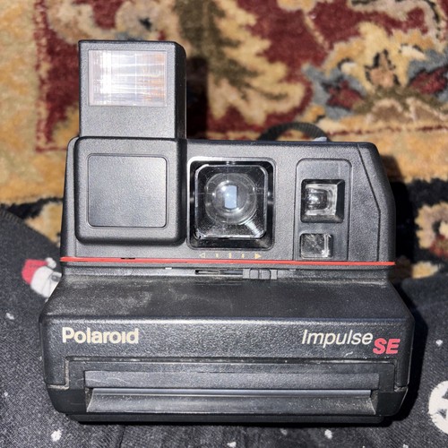 Polaroid impulse 600 - polaroid,