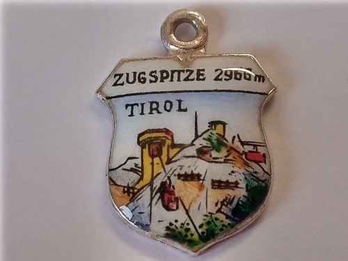 Silver travel shield charm