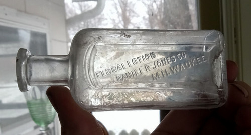 1892 dated floral lotion - dated,