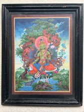 Green Tara portrait in lotus position 