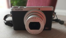 Fuji XQ2  Compact Digital Camera  c/w Ever Ready case and  32GB SD card