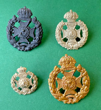 RIFLE BRIGADE CAP BADGES.