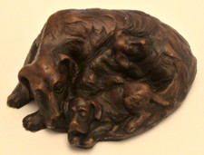 Beautiful carved dog curled up with two puppies. Brown ceramic/porcelain? 6  X 5