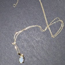 9ct Yellow Gold thin necklace and natural opal pendant fully Hallmarked