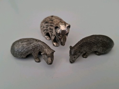 Metal badger figures one - x3,