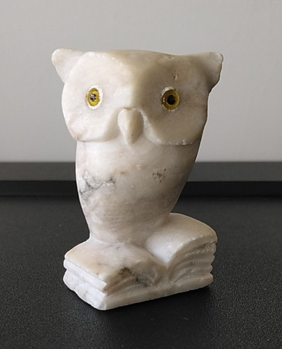 Hand carved stone figurine owl - hand,