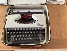 OLYMPIA SPLENDID 66 Typewriter with original case .