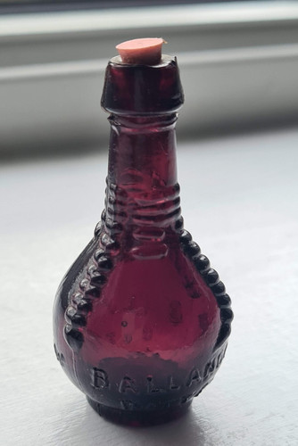 Vintage ball and claw bitters - and,