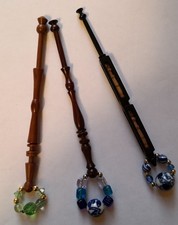 Trio of hand turned wood novelty lace bobbins with spangles