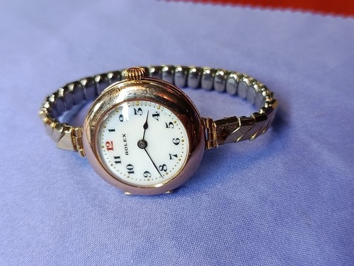 Rolex reberg trench 9ct gold