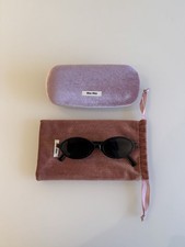Miu Miu Regard Sunglasses