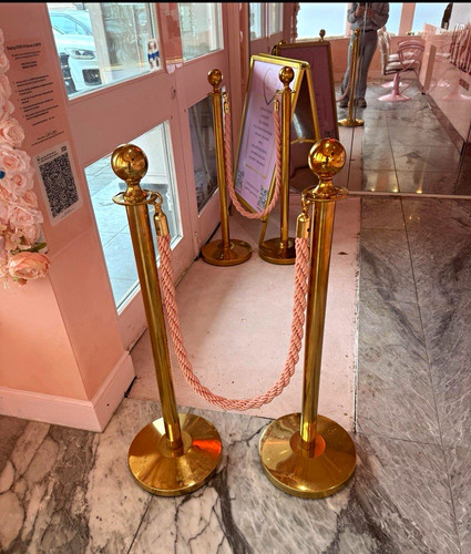 Gold stanchion posts with red - stanchion,