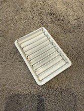 ceramic soap dish with a removable stainless steel drainer