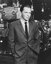 Frank Sinatra standing by slot