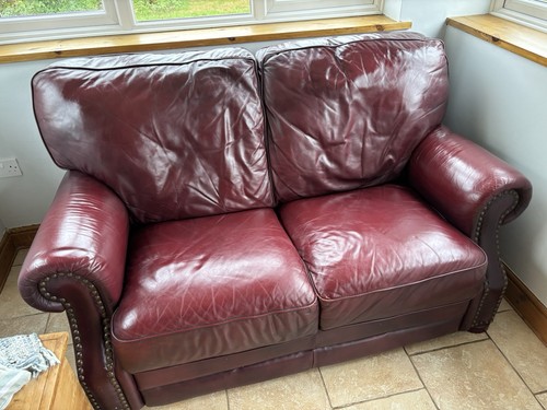 Burgundy two seater leather