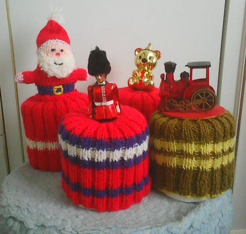 Doll toilet roll covers