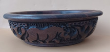 Wooden Bowl  with carved African animals around the sides.