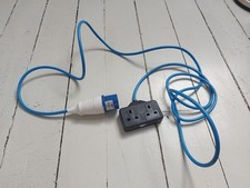 electric hook-up lead for caravans CEEform plug and a UK 3-pin socket adaptor.