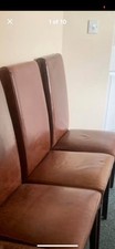 Two John Lewis Brown Leather Chairs With Cherry Wood Legs.