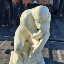 Ceramic Seated Man Sculpture