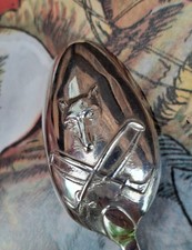 A sterling silver hallmarked teaspoon of hunting interest with fox and hunt whip
