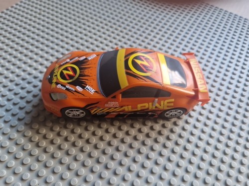 Scalextric orange nissan - scalextric,