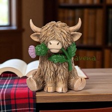 Highland cow with thistle - cow,