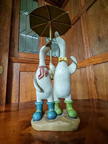 Wooden ducks with umbrella - with,