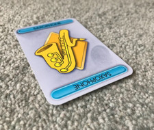 Spare Replacement Saxophone Weapon Card for The Simpsons Cluedo Board Game.