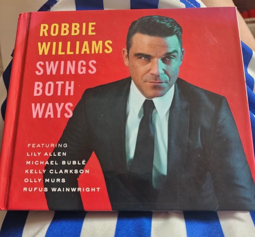 Robbie williams swings both - williams,