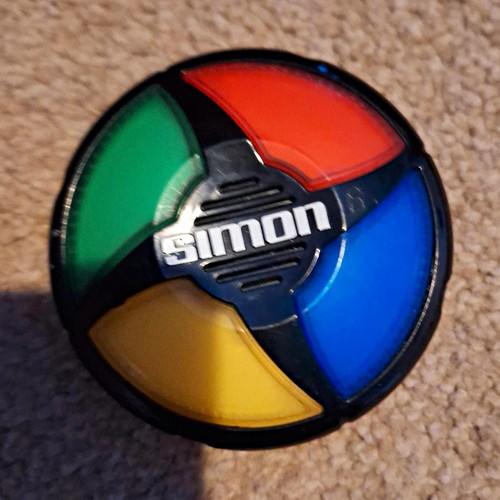 Hasbro simon handheld - hasbro,