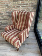 High wing back armchair